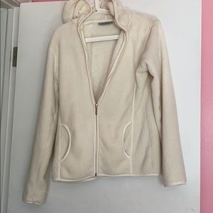 a white fuzzy jacket